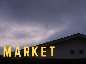 A sign that reads market on top of a building