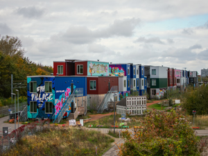 Colorful shipping containers converted into housing units.