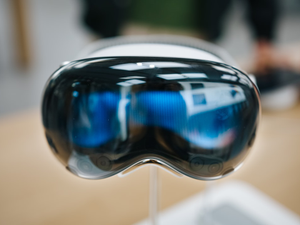 Close-up of Apple Vision Pro on front display on a blurred background