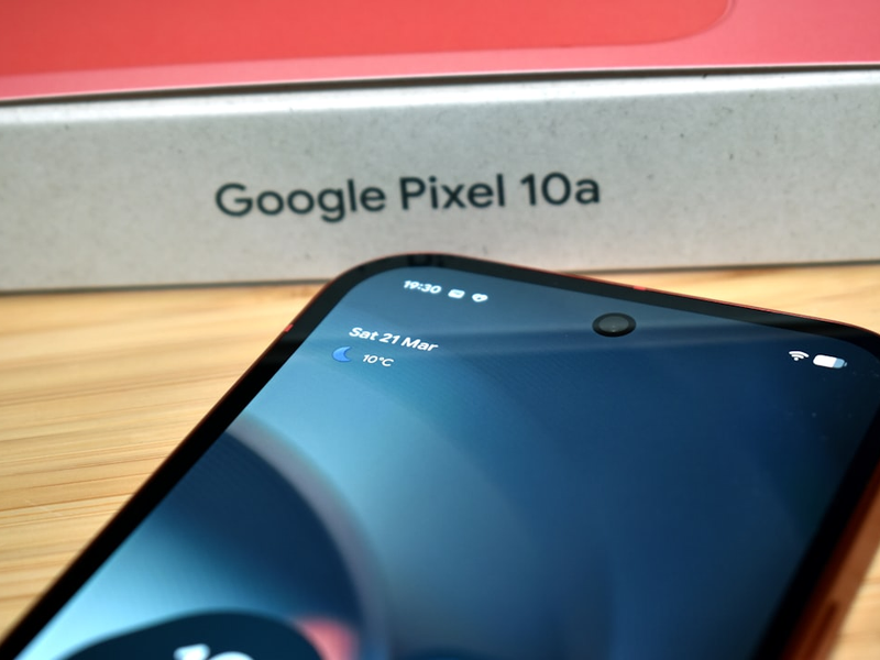 Google pixel 10a box with a smartphone