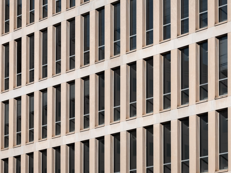 Exterior of the U.S. Department of Education building in Washington D.C., featuring brutalist architecture.