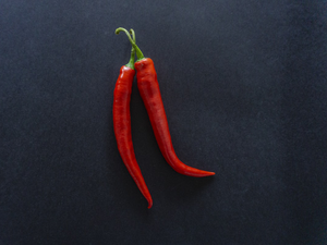 Chili peppers on a black background