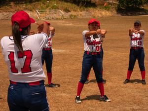 Women getting ready to play an amateur softball game. Laguna de San Carlos, Panama.