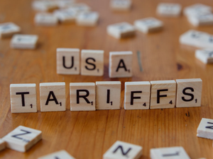 A close up of scrabble tiles spelling the word usa, tarifs