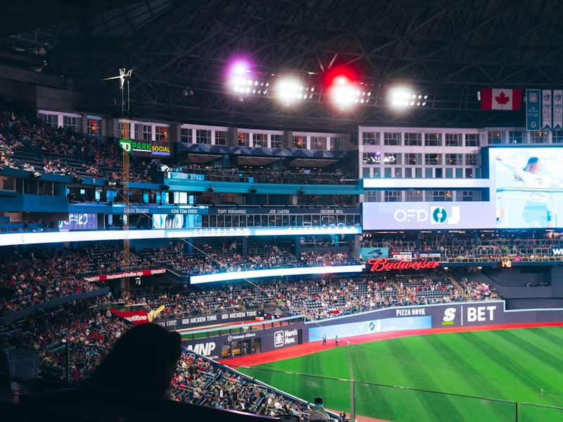 A baseball stadium filled with lots of people