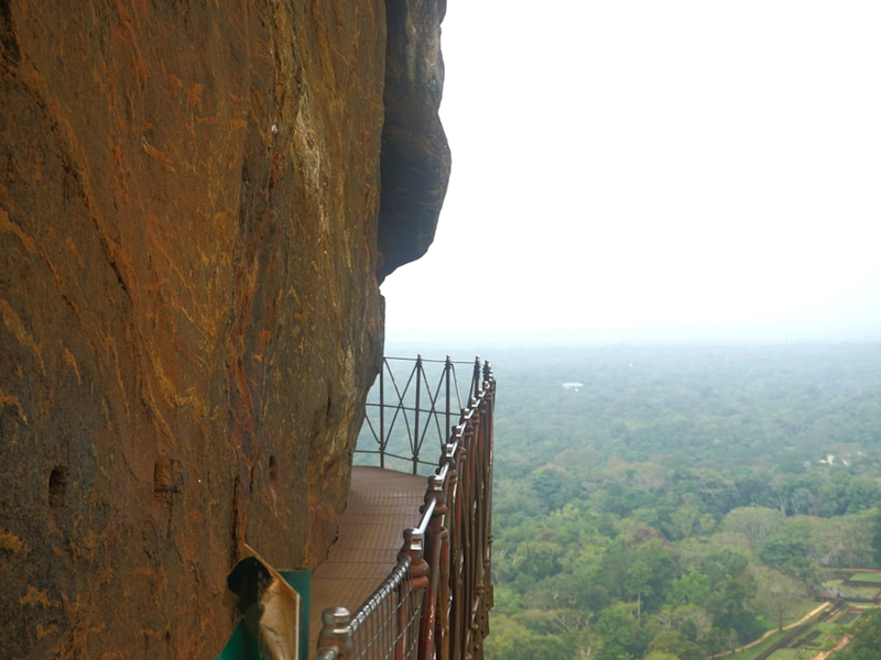 a person standing on a cliff