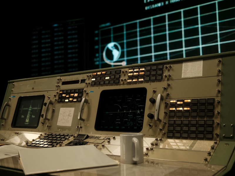 A control panel in a building at night