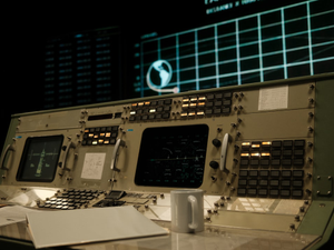 A control panel in a building at night
