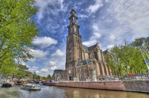 A barge converted into a refuge for abandoned cats, a huge protestant church, a historic museum, and more canals? Yes, in case you wondered, you are in Amsterdam :).