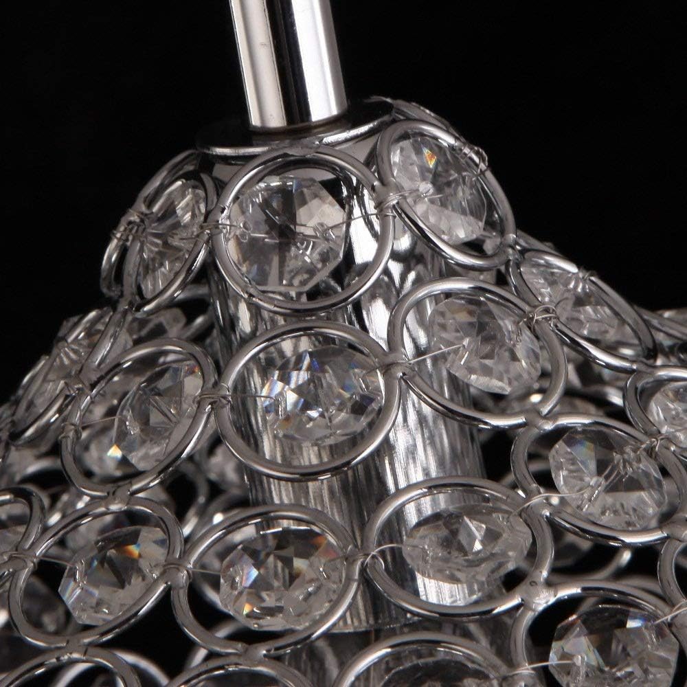 crystal pendant lights hang over a modern