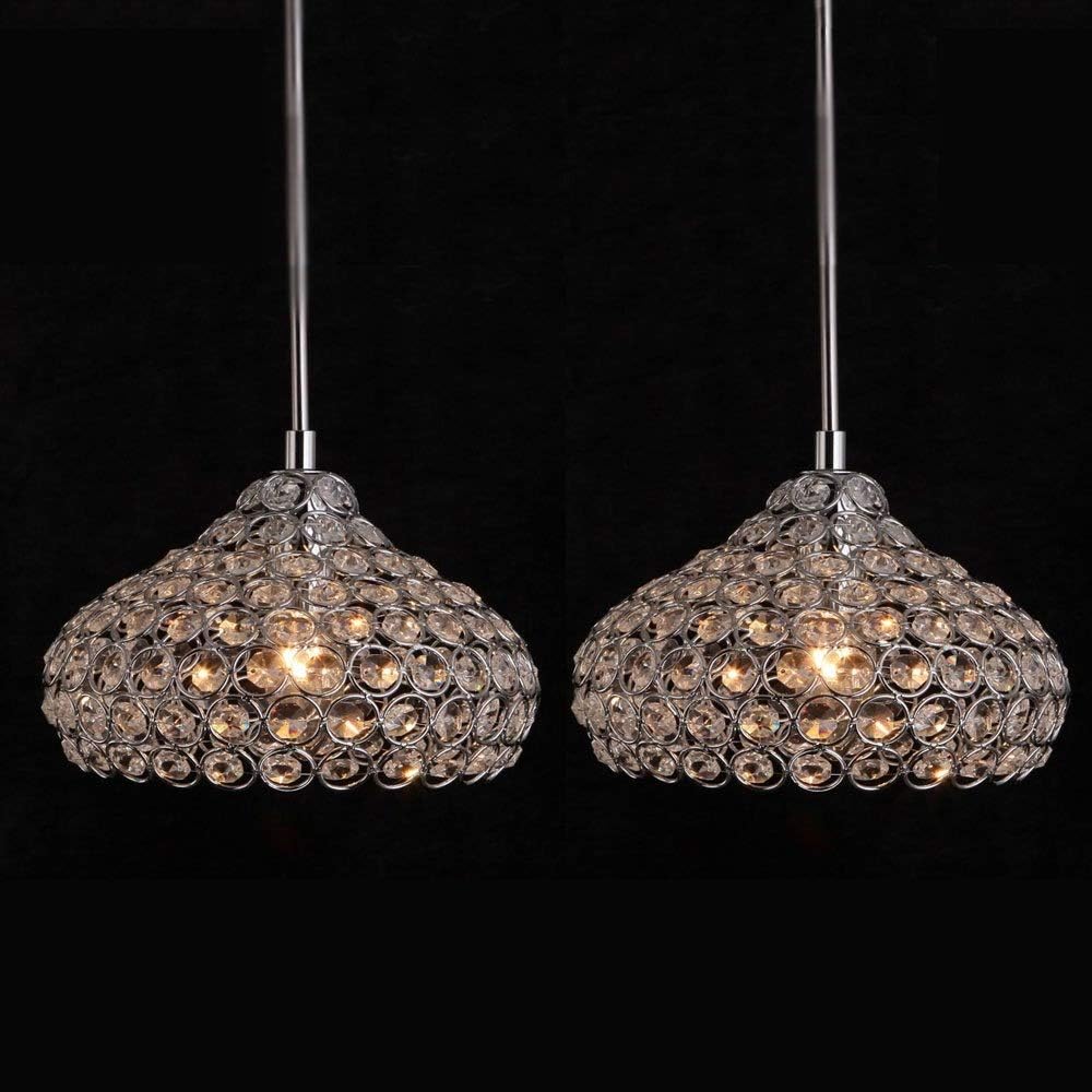 crystal pendant lights hang over a modern