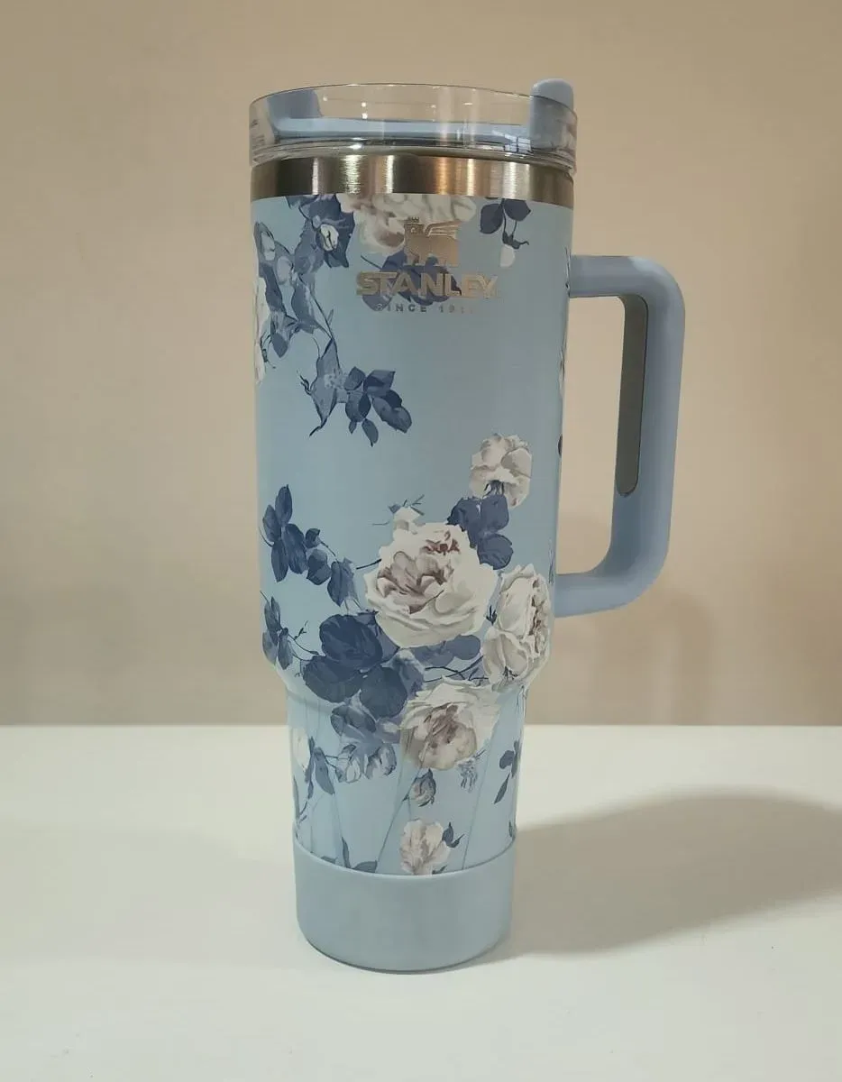 Product gallery 9aa0c9c9-1859-4e0d-b5f2-f91476c04646-VASO QUENCHER CELESTE Y FLORES.jpg