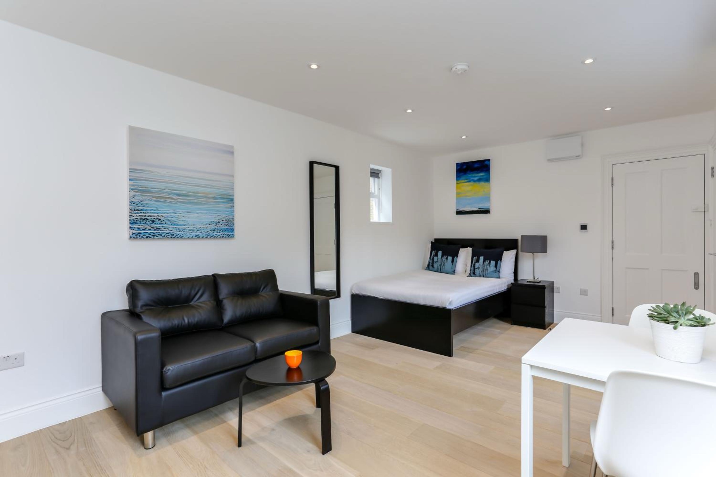 Living room with a sofa and bed
