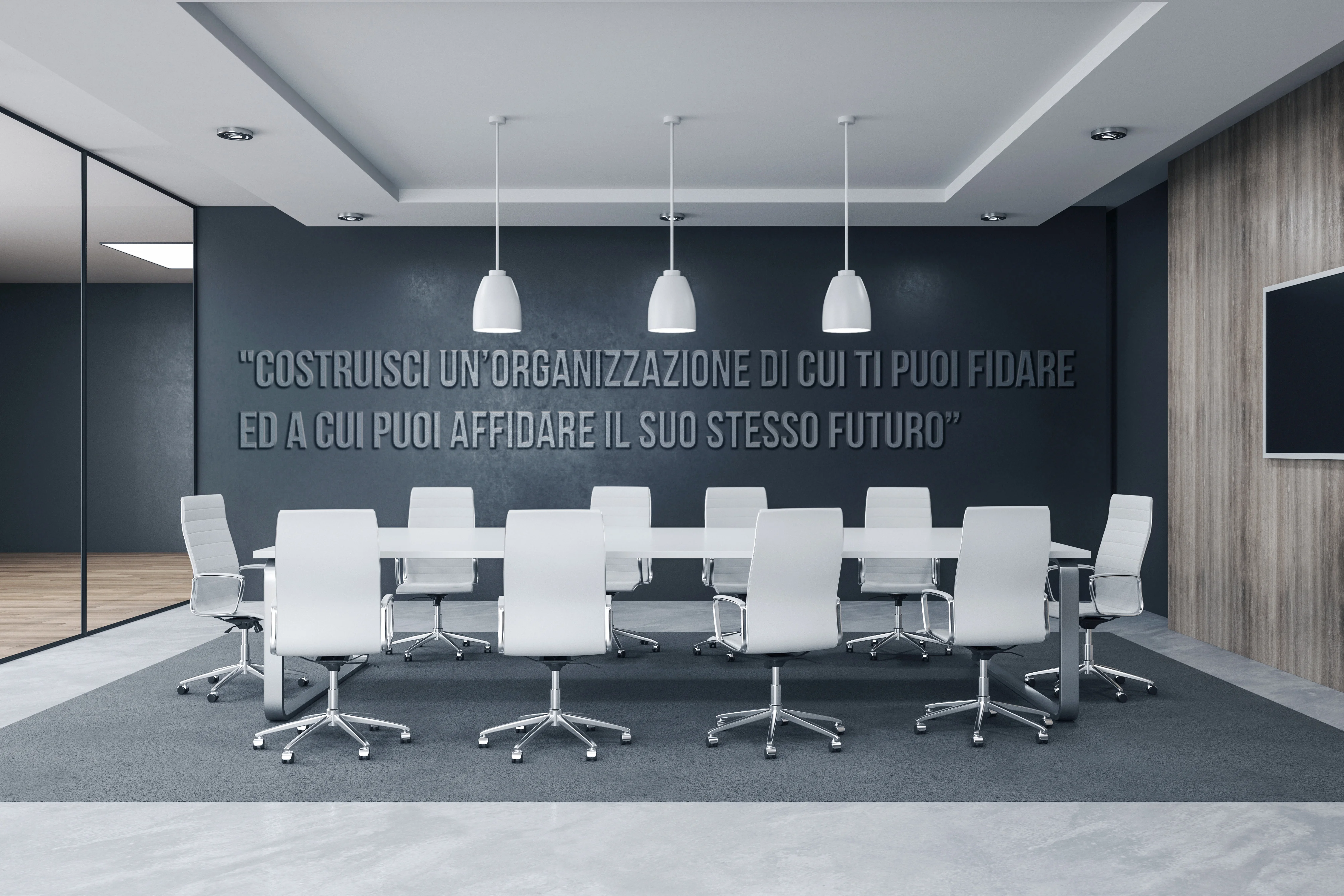 Foto di una sala riunioni con sfondo citazione