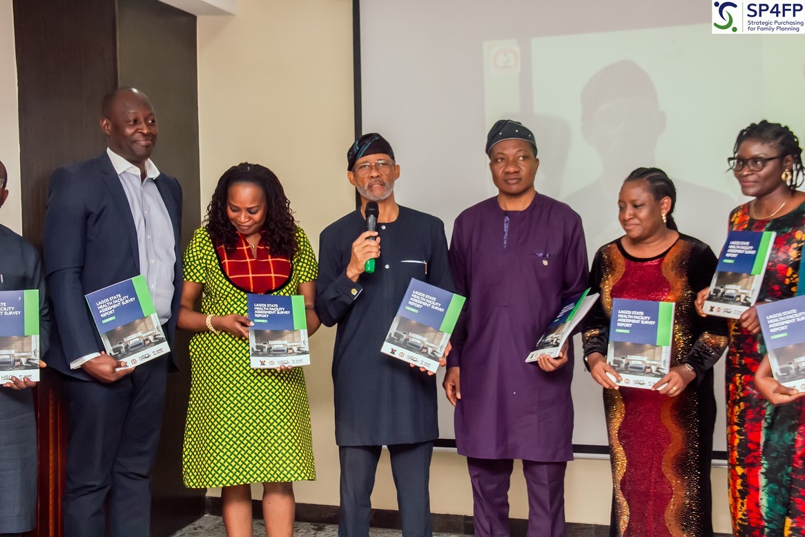 The Honorable Commissioner for Health Lagos State flanked by other high-level stakeholders at the report dissemination