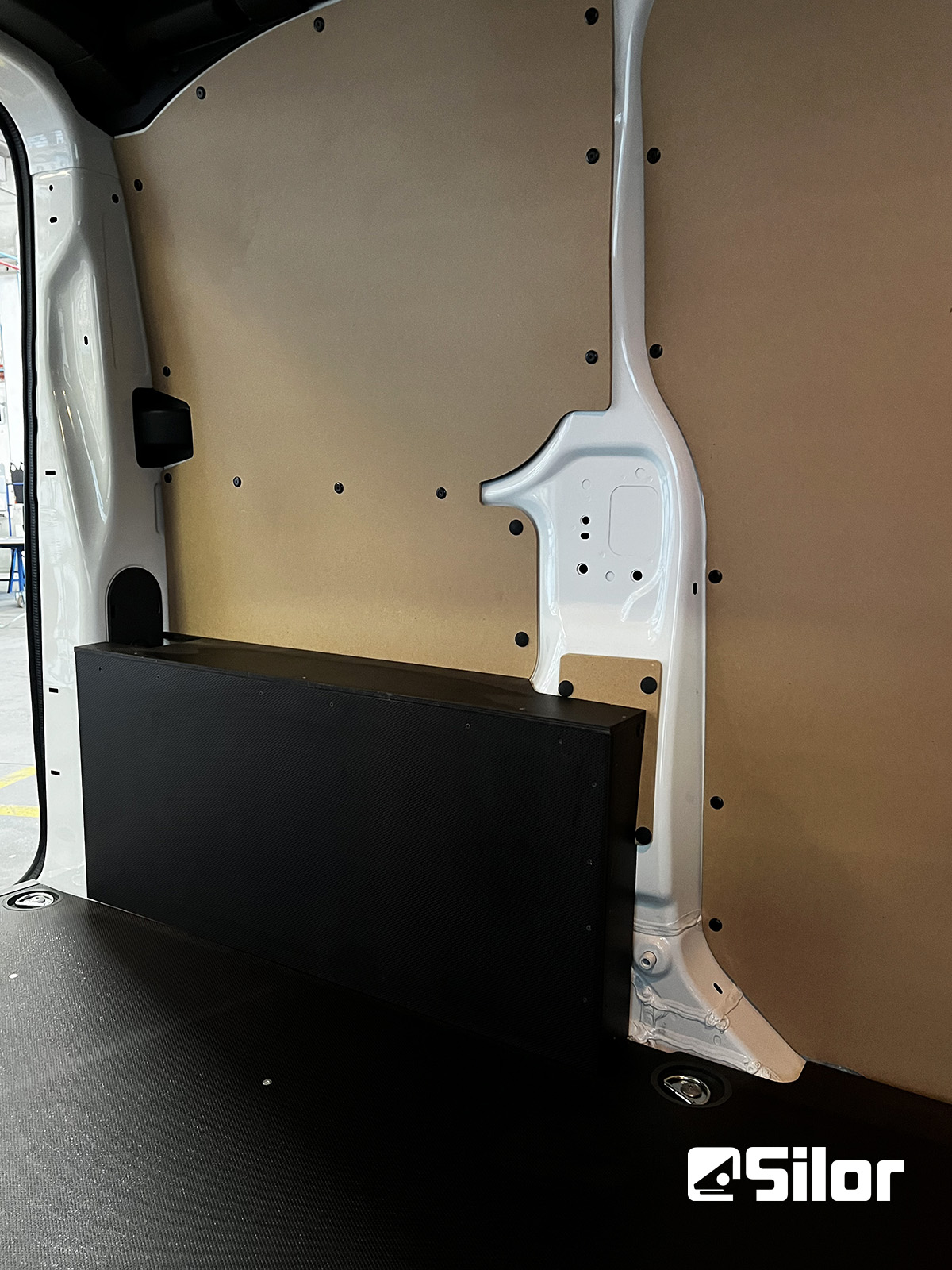 Interno furgone commerciale.
