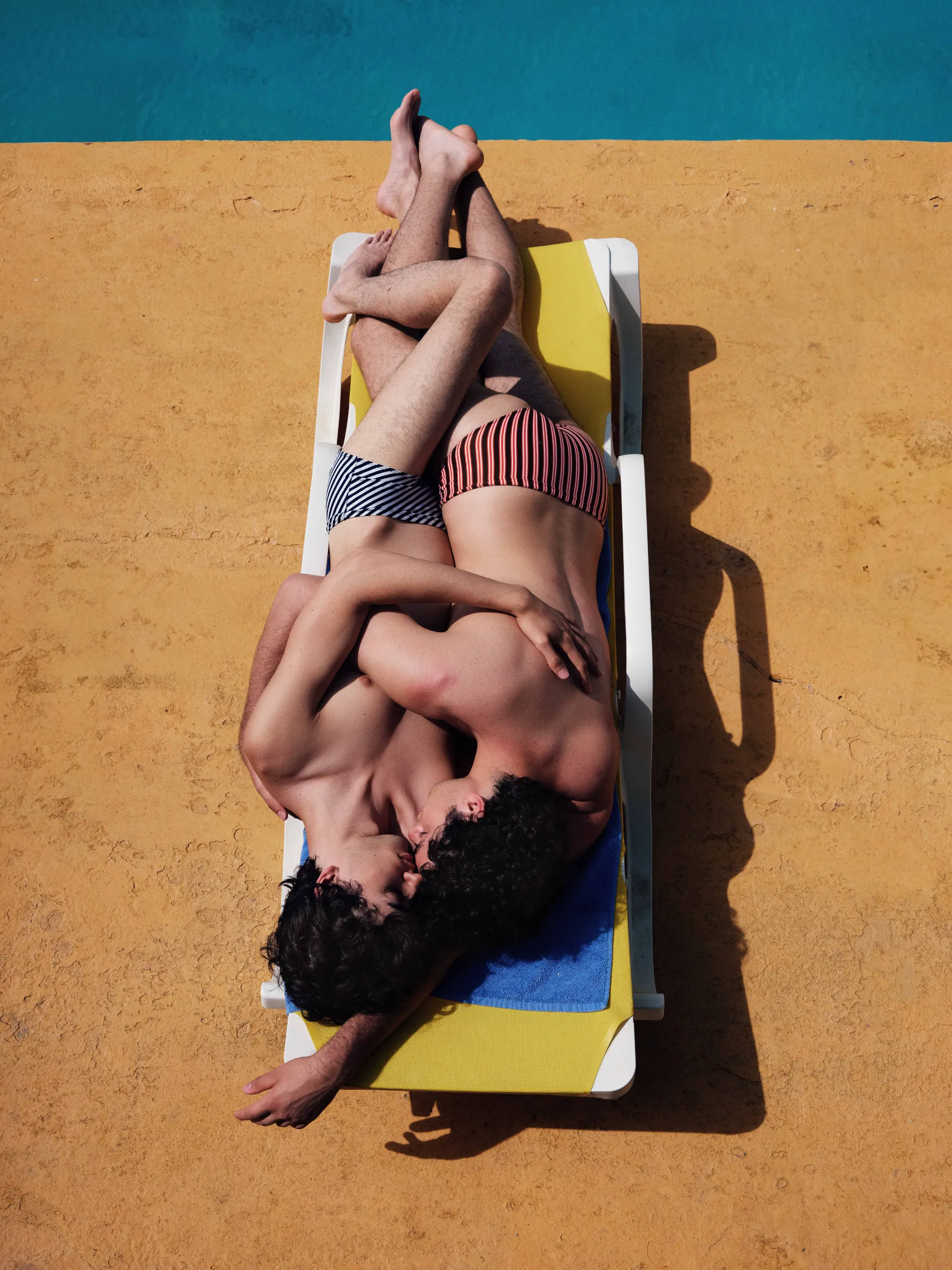 Two boys kissing - View 1