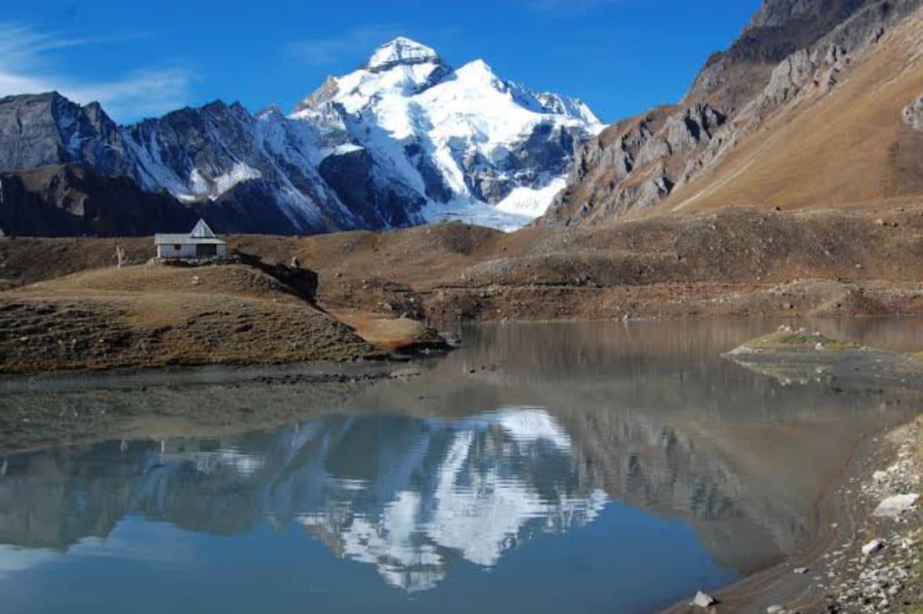 Sacred Parvati Kund with mountain backdrop
