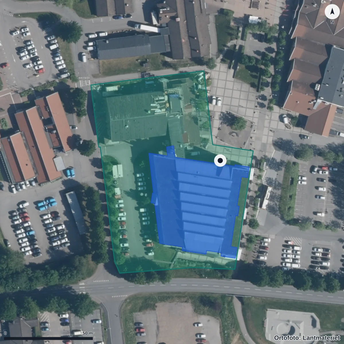 Flygbild över Akademi Båstad vuxenutbildning, ortofoto från Lantmäteriet