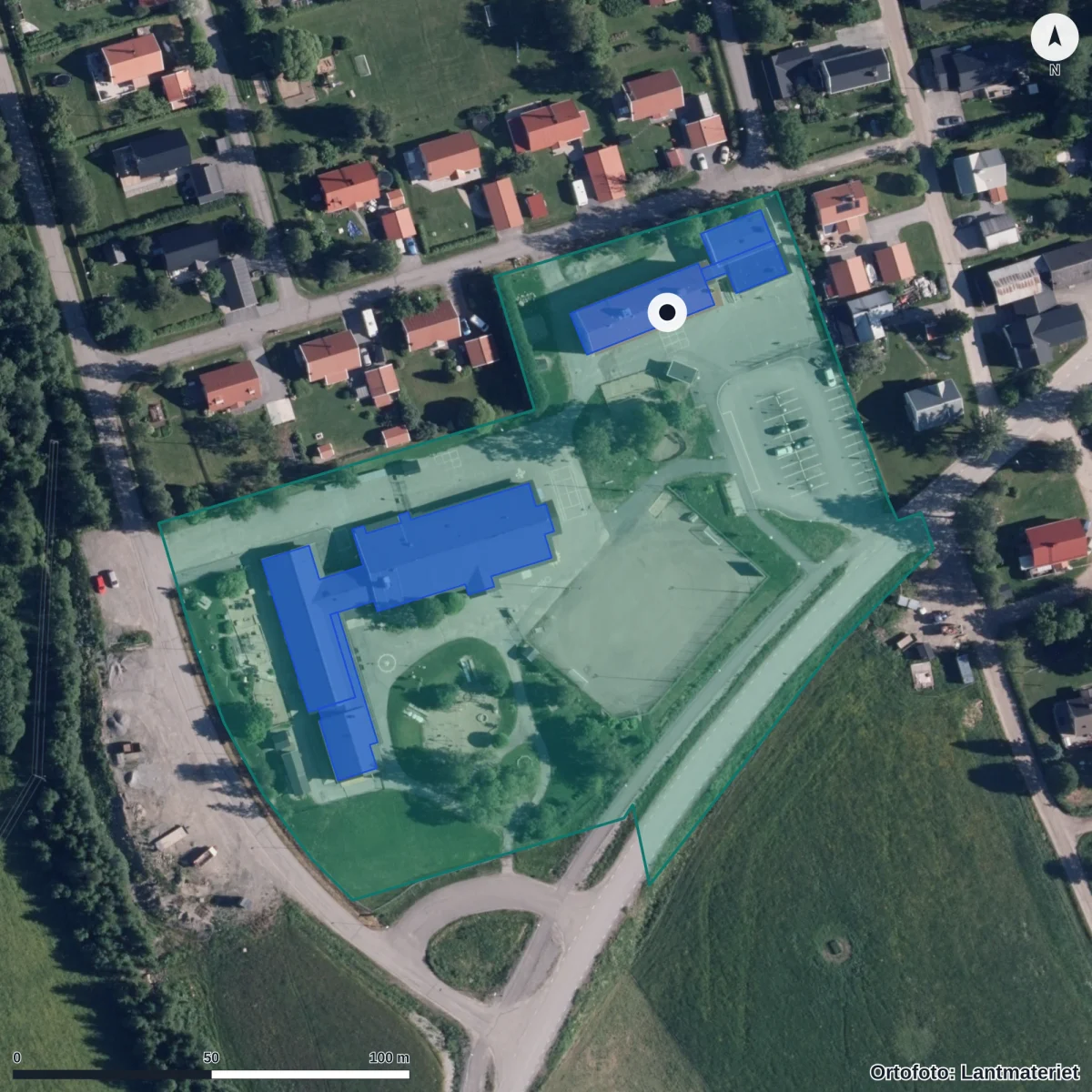 Flygbild över Tavelsjö skola, ortofoto från Lantmäteriet