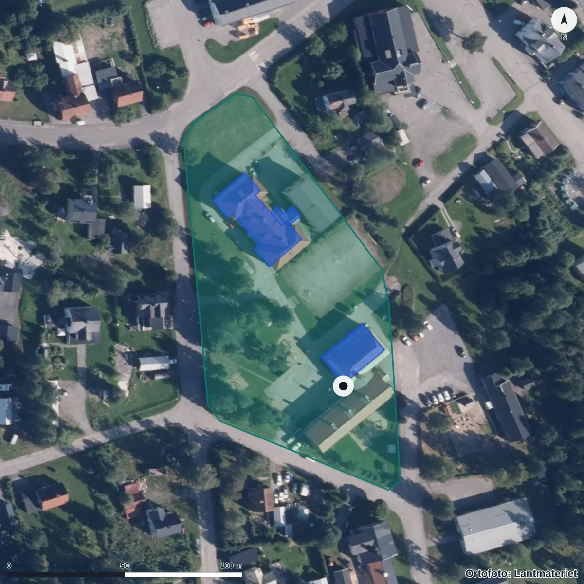 Flygbild över Nordmalings vuxenutbildning, ortofoto från Lantmäteriet