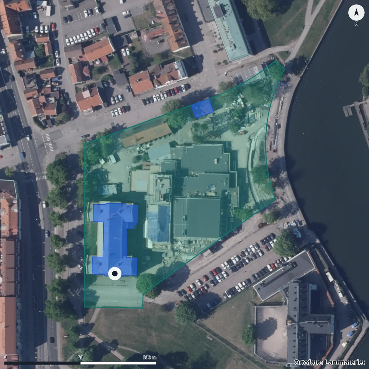 Flygbild över Central Insamlingsenhet-Skolmottagningsenheten, ortofoto från Lantmäteriet