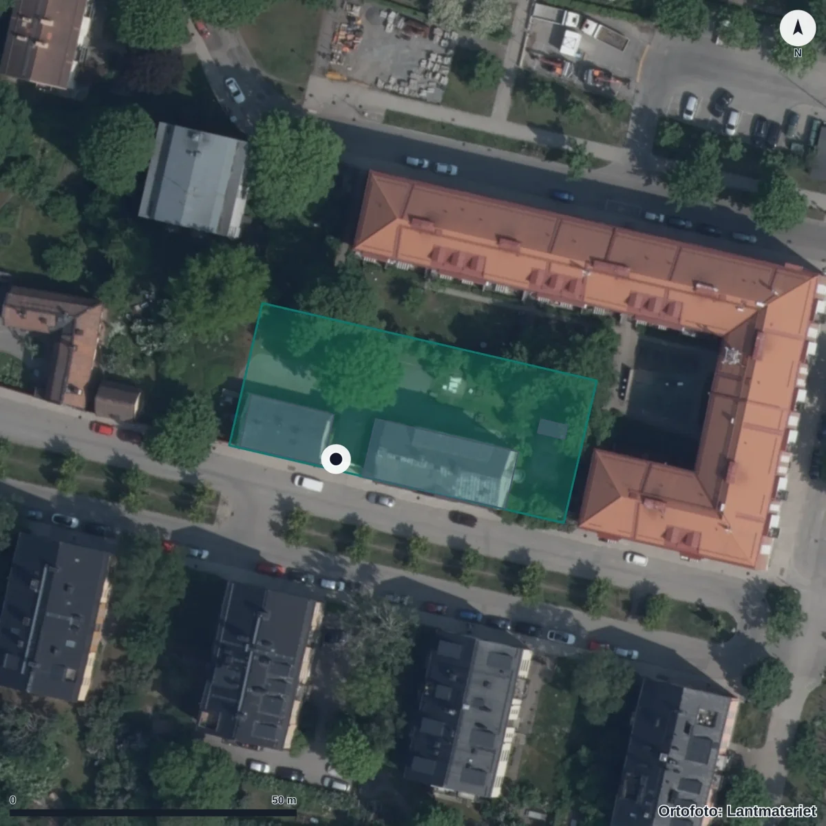 Flygbild över Magelungen Gymnasium Södermalm, ortofoto från Lantmäteriet