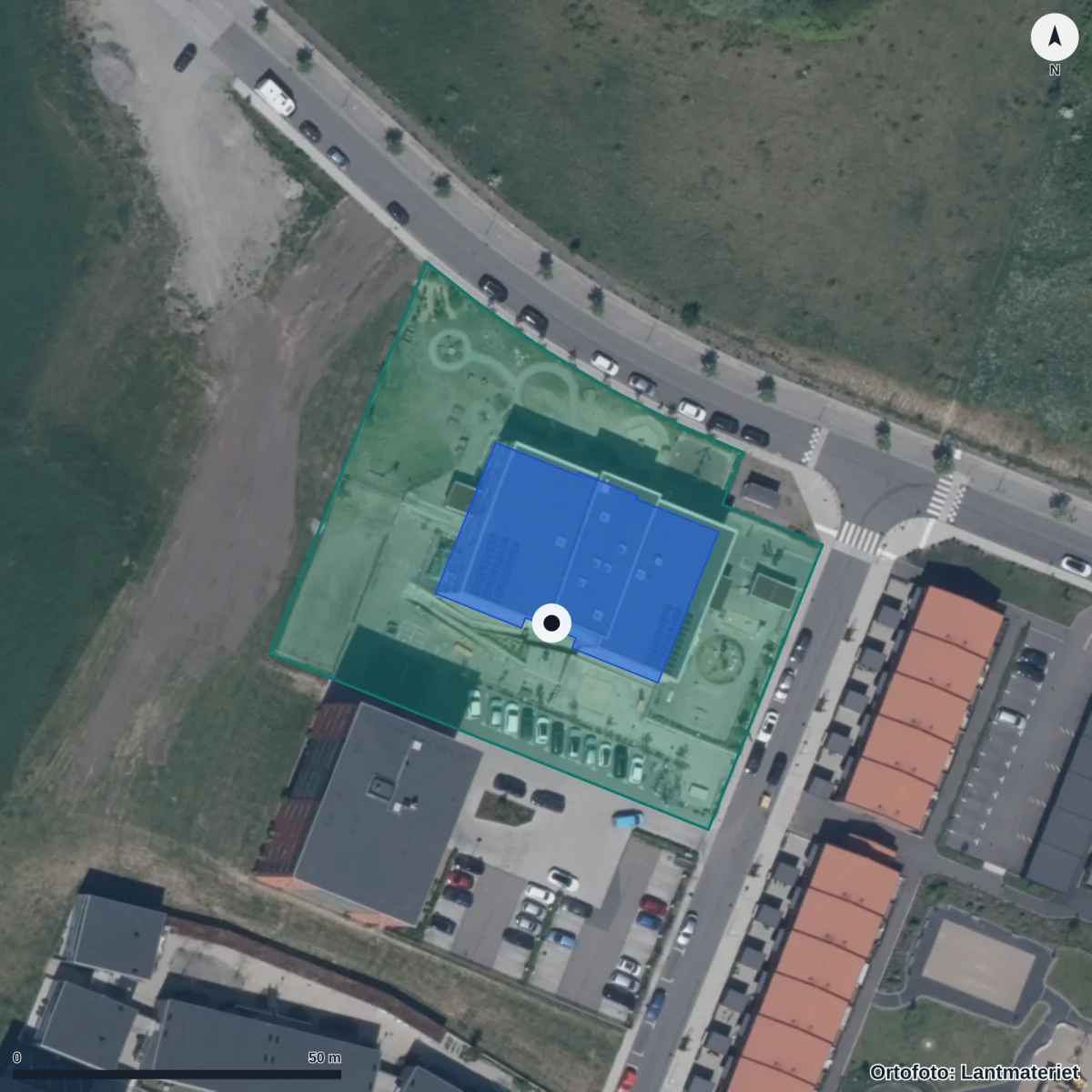 Flygbild över Montessori Mondial Sjöstaden, ortofoto från Lantmäteriet