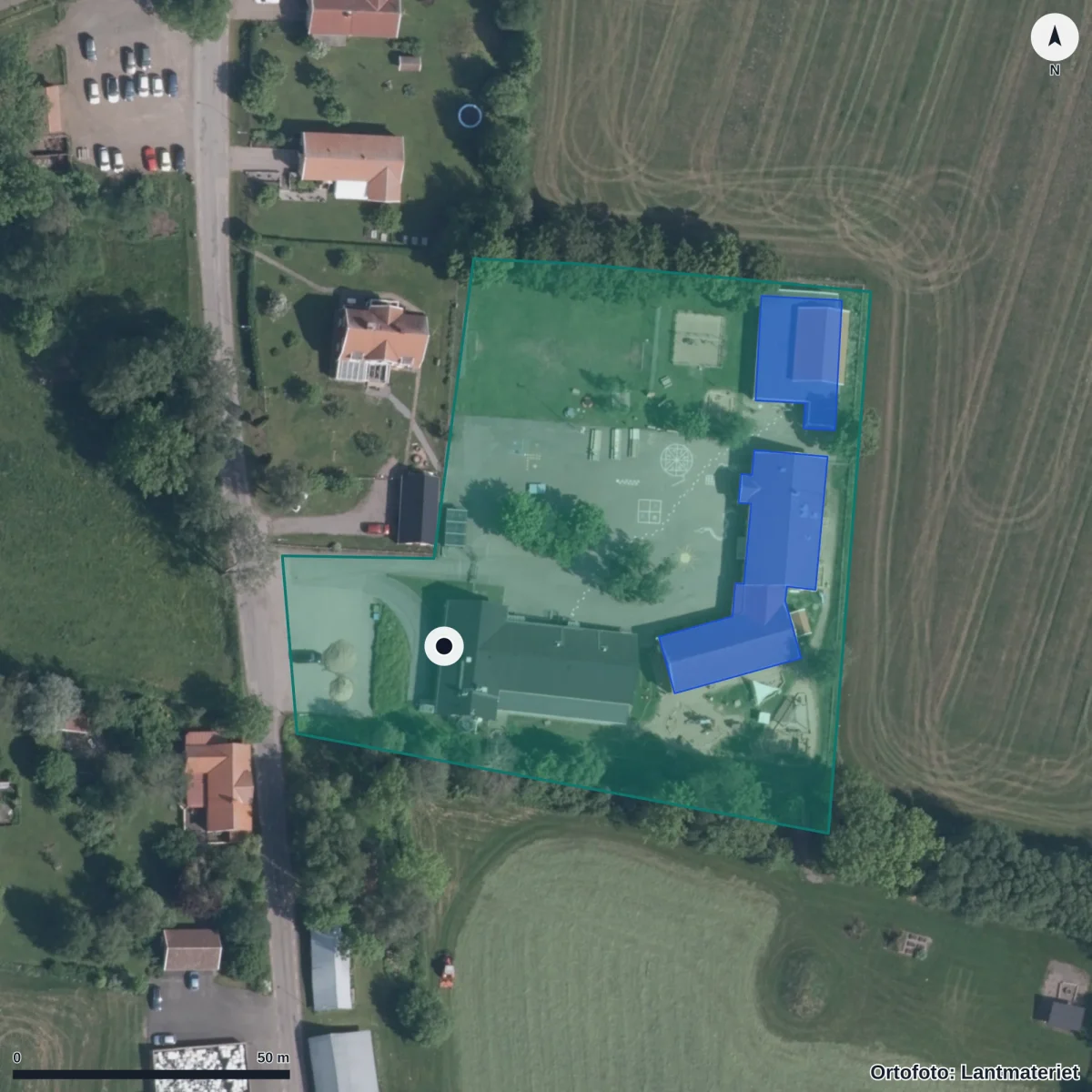 Flygbild över Åsle Friskola, ortofoto från Lantmäteriet