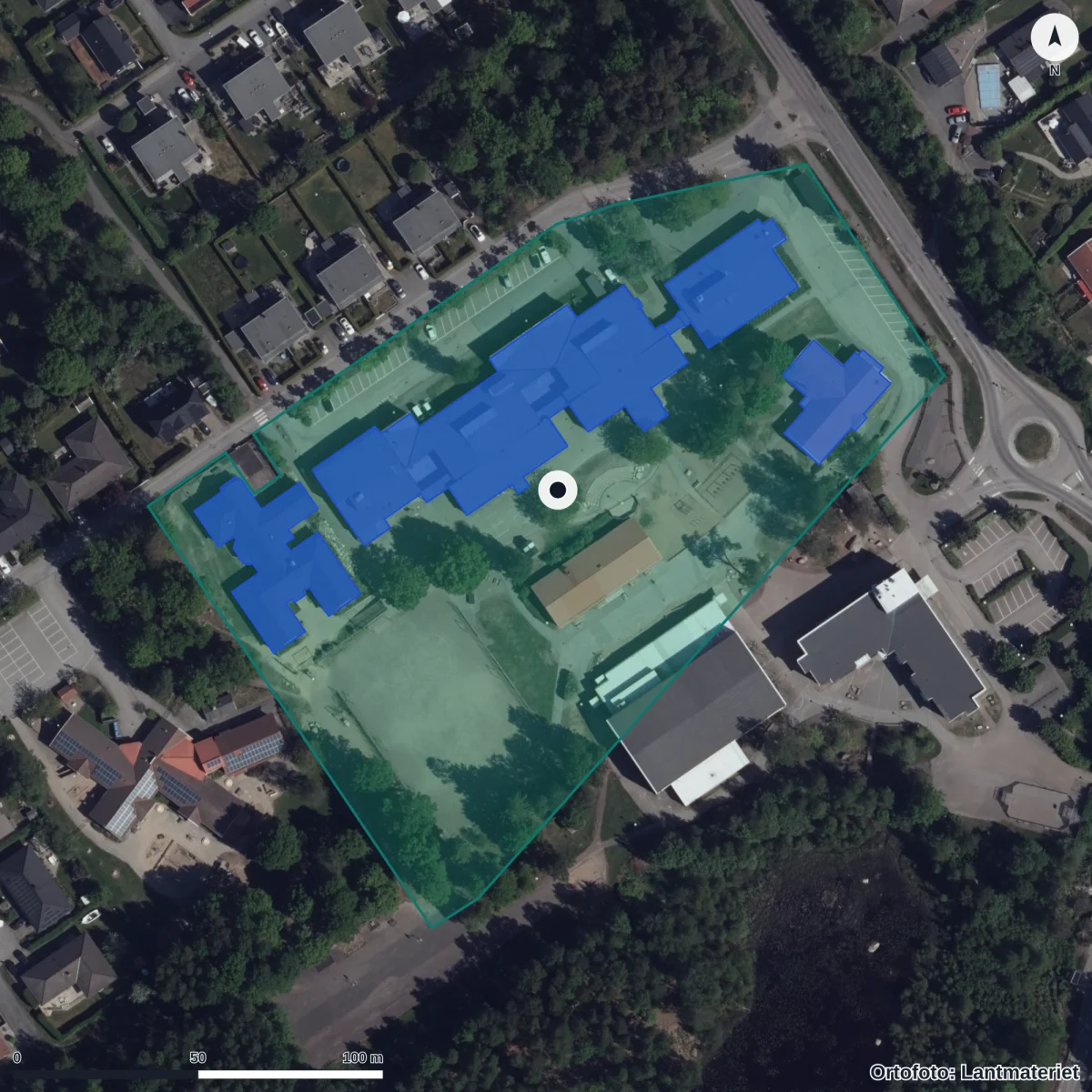 Flygbild över Presseskolan, ortofoto från Lantmäteriet