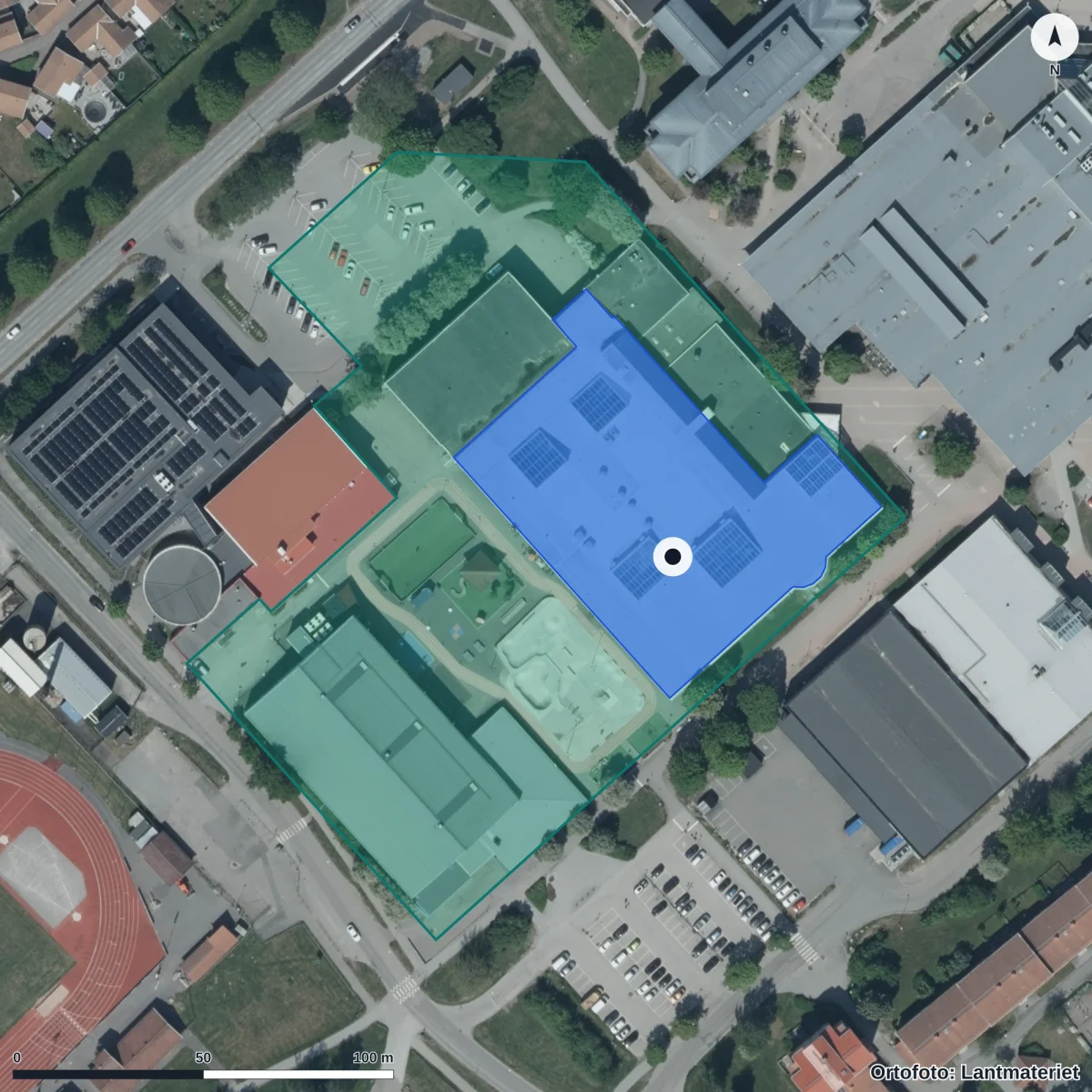 Flygbild över Fridegårdsgymnasiet, ortofoto från Lantmäteriet