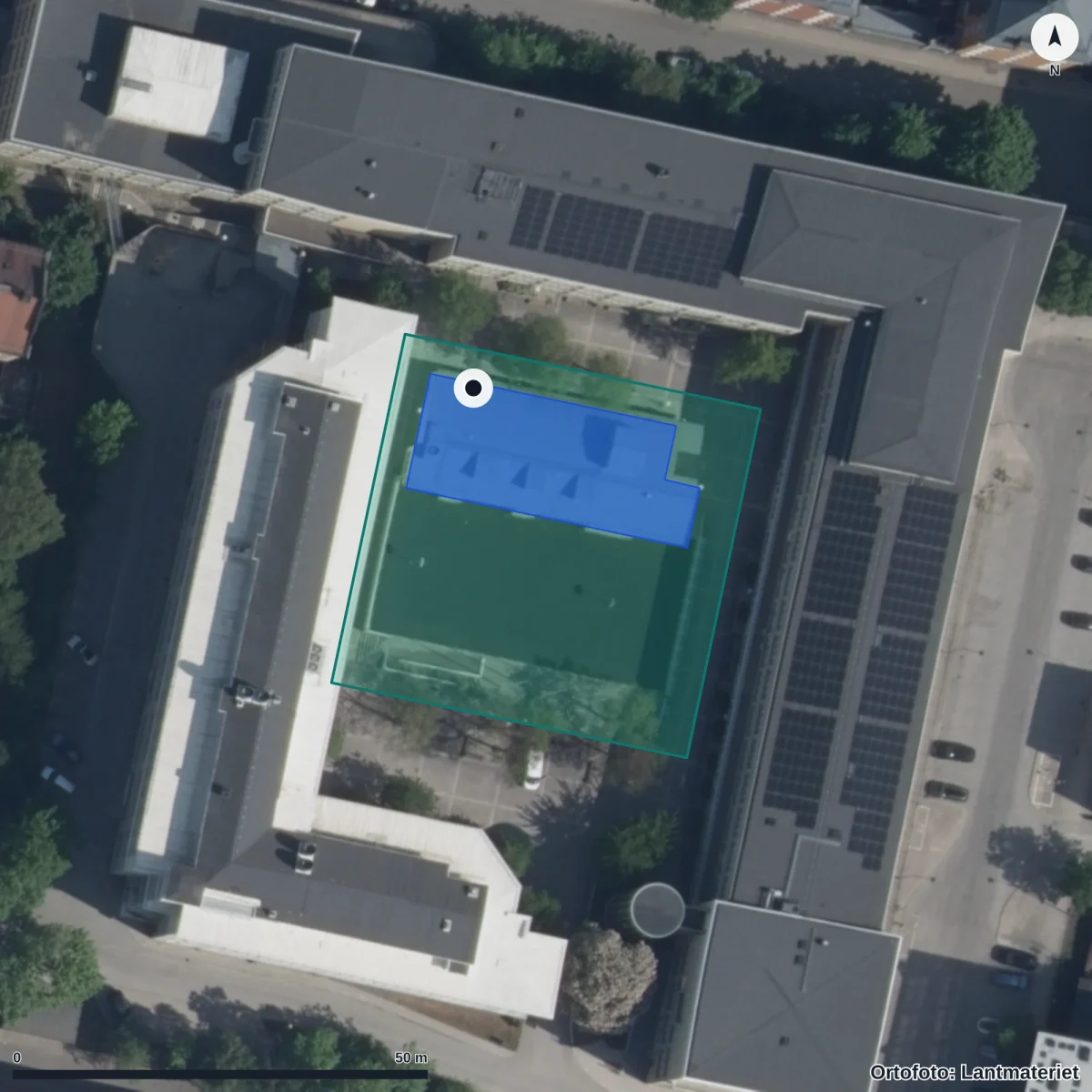 Flygbild över Polhems anpassade gymnasieskola, ortofoto från Lantmäteriet