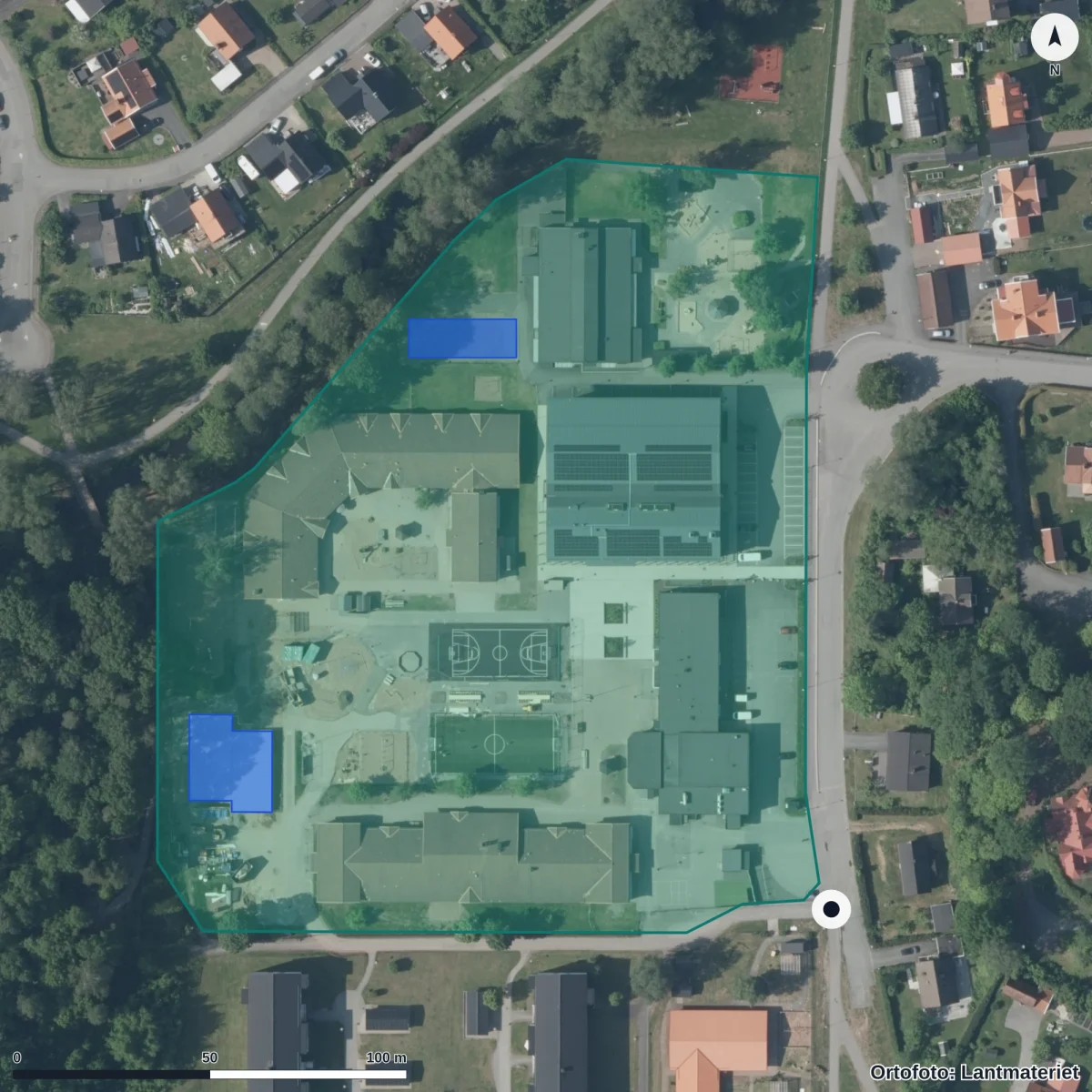 Flygbild över Grevhagsskolan, ortofoto från Lantmäteriet