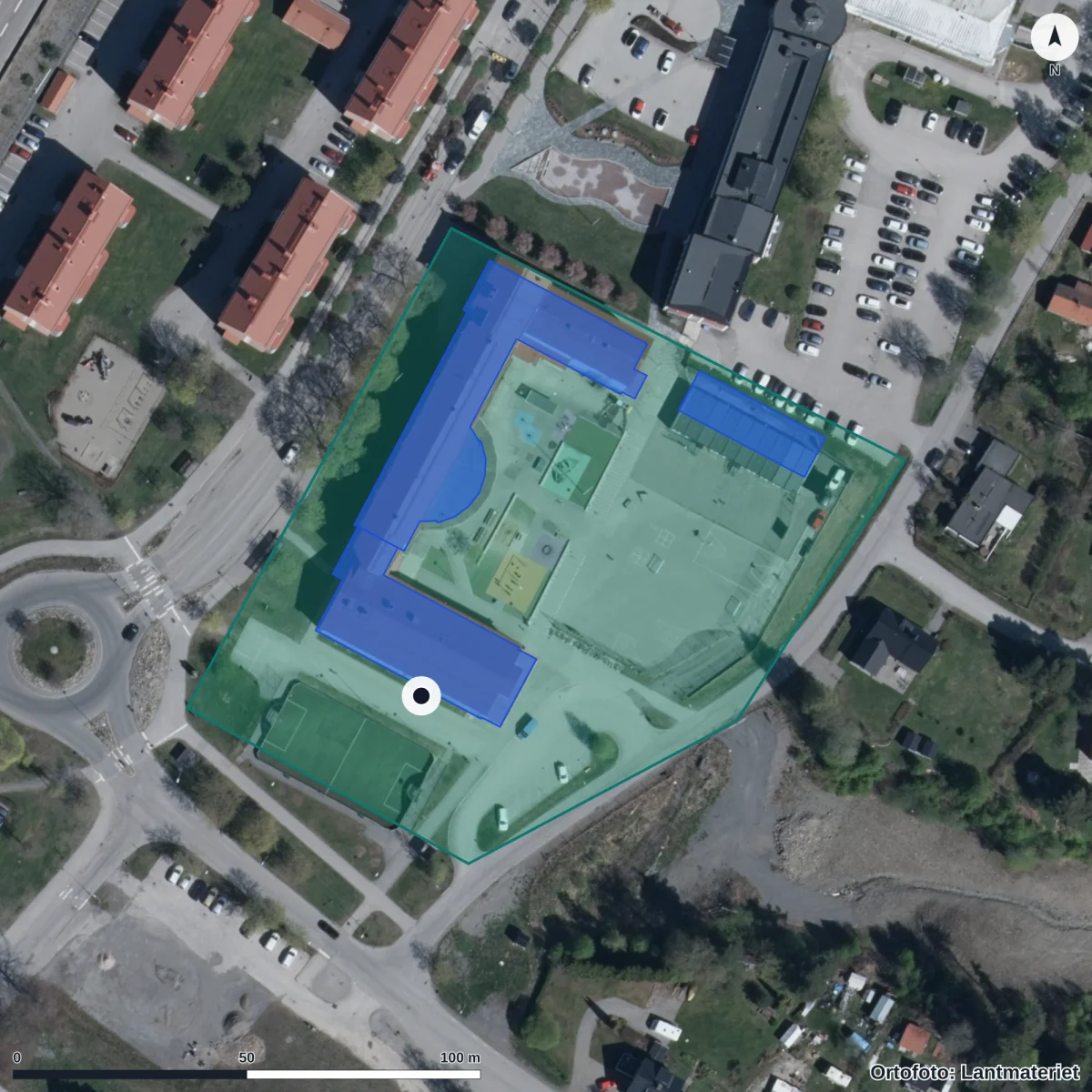 Flygbild över Mariedalsskolan, ortofoto från Lantmäteriet