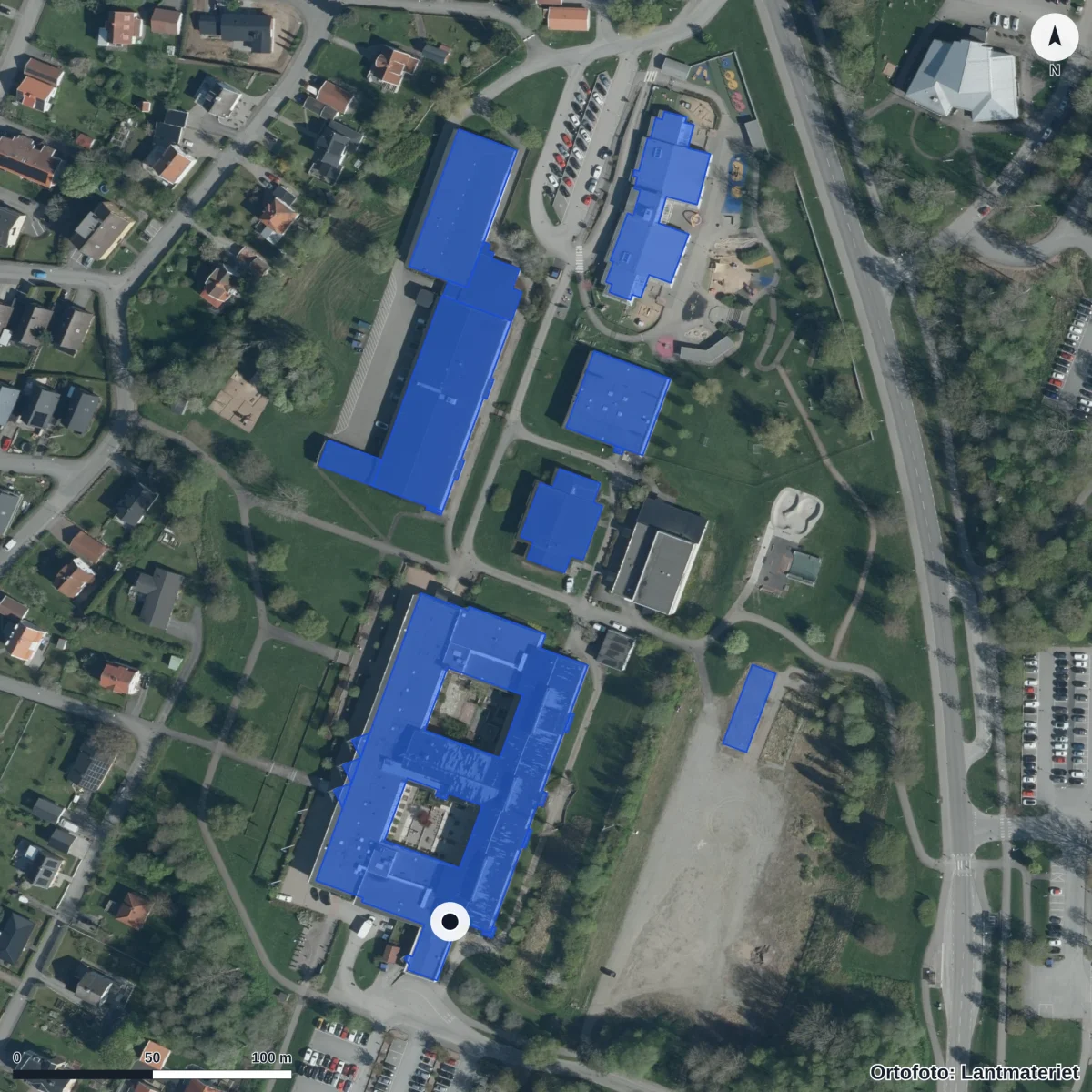 Flygbild över Tingsholmsgymnasiet, ortofoto från Lantmäteriet