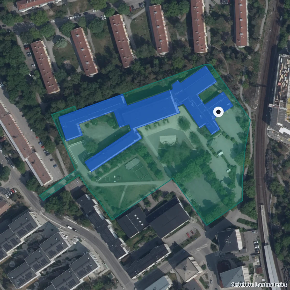 Aerial view of Kärrtorps gymnasium, orthophoto from Lantmäteriet
