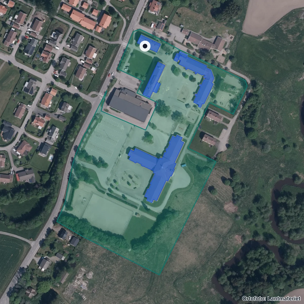 Flygbild över Sjuntorpskolan, ortofoto från Lantmäteriet