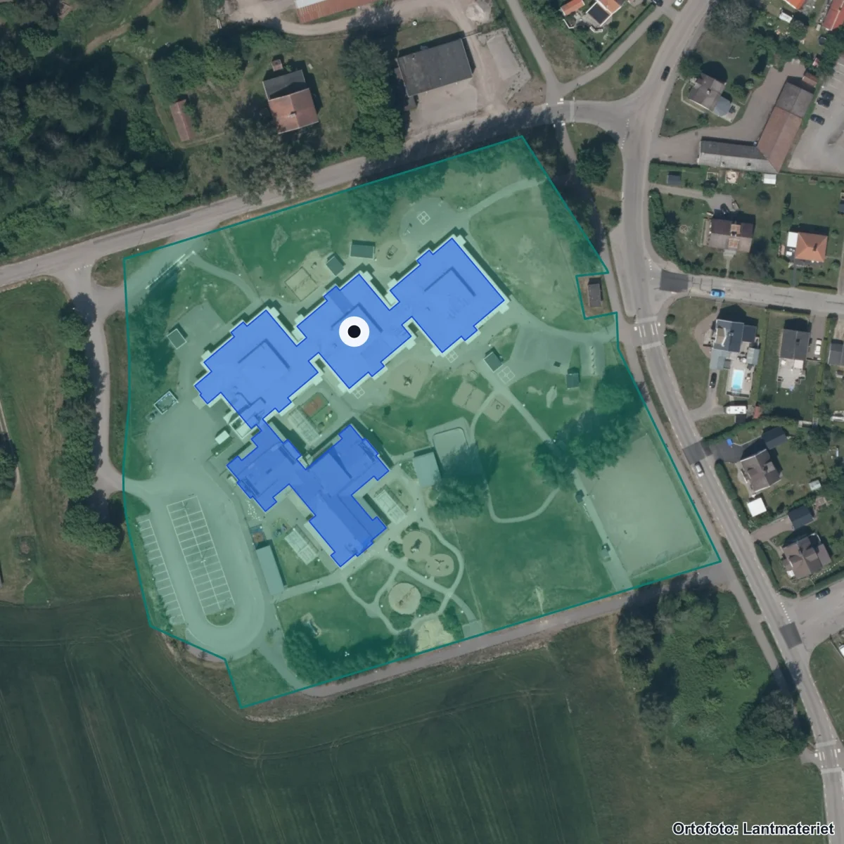 Flygbild över Bjälbotullskolan, ortofoto från Lantmäteriet
