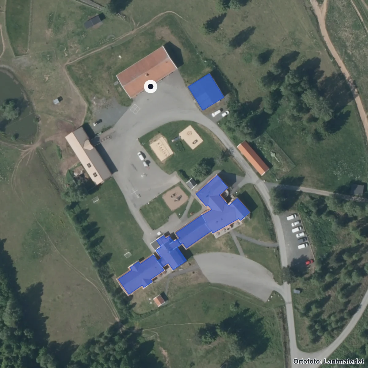 Flygbild över Oasen Utbildningscenter AB, ortofoto från Lantmäteriet