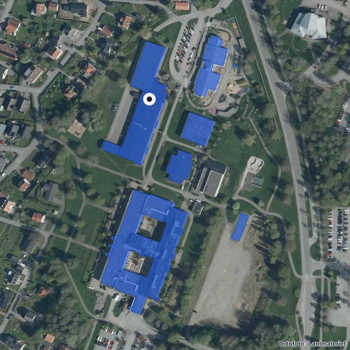 Flygbild över Tingsholmsgymnasiet, ortofoto från Lantmäteriet