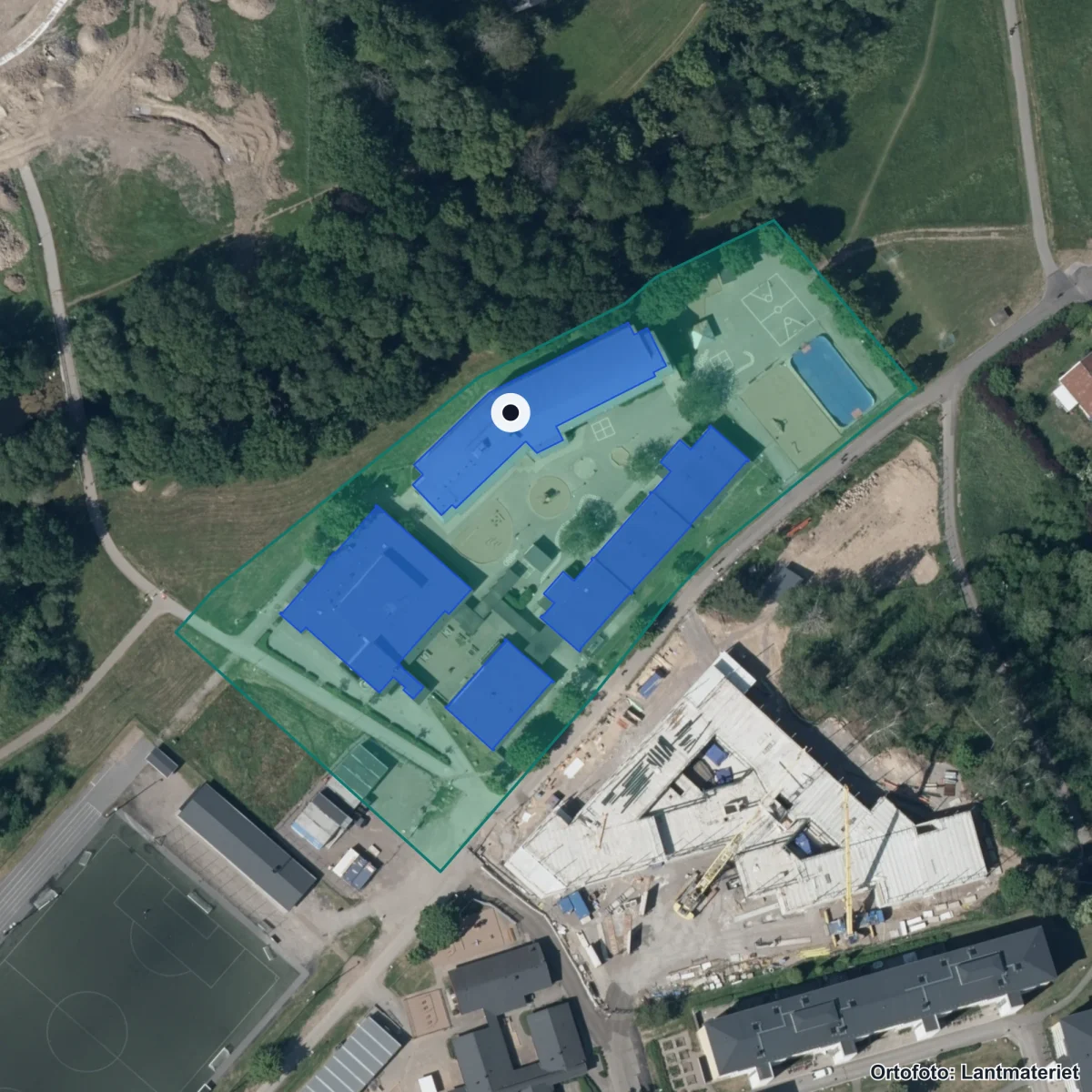 Flygbild över Bäckskolan, ortofoto från Lantmäteriet