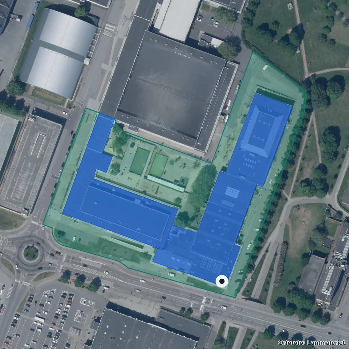 Flygbild över Move & Walk Anpassad Gymnasieskola, ortofoto från Lantmäteriet