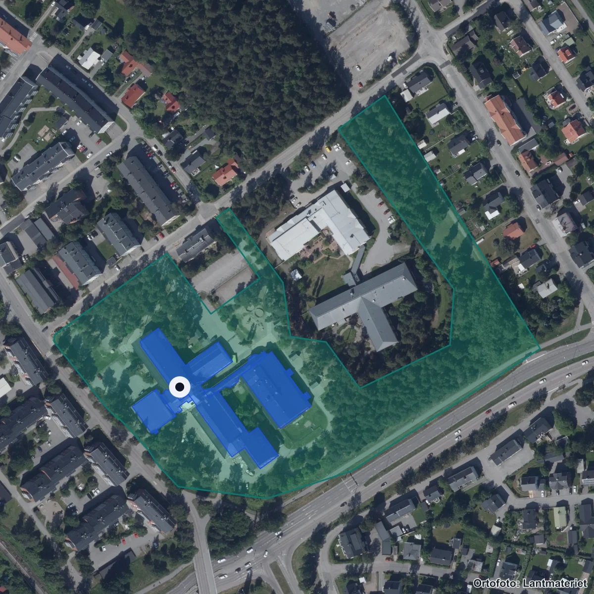 Flygbild över Nya Läroverket Bergviken, ortofoto från Lantmäteriet