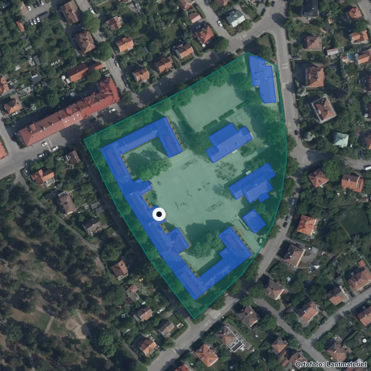 Flygbild över Gamla Enskede skola, ortofoto från Lantmäteriet