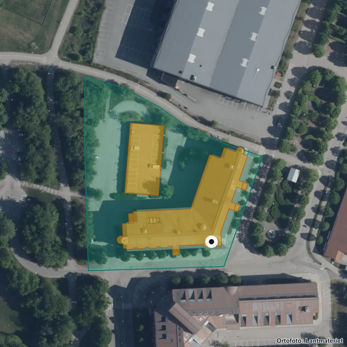 Flygbild över Sandbergska skolan Upplands Väsby, ortofoto från Lantmäteriet