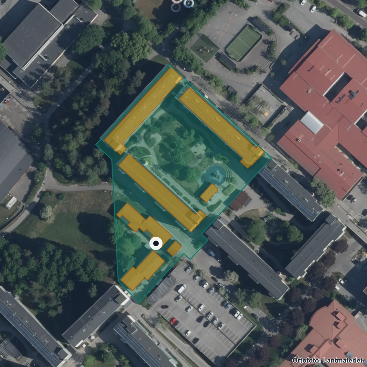 Flygbild över Förskolan Regnbågen Solrosen, ortofoto från Lantmäteriet