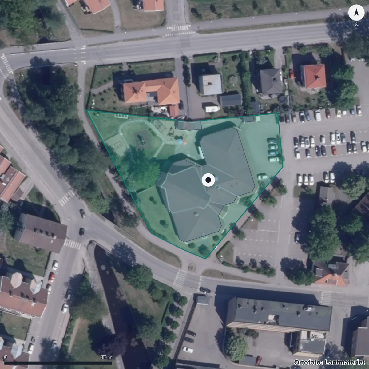 Flygbild över Pingstliljans Förskola, ortofoto från Lantmäteriet