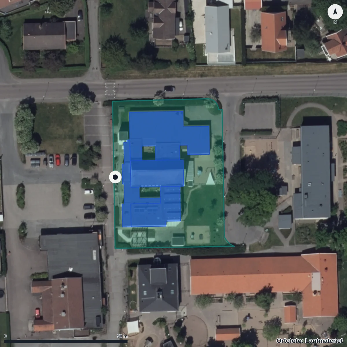 Flygbild över Pärlan, Näsets Kyrka, ortofoto från Lantmäteriet