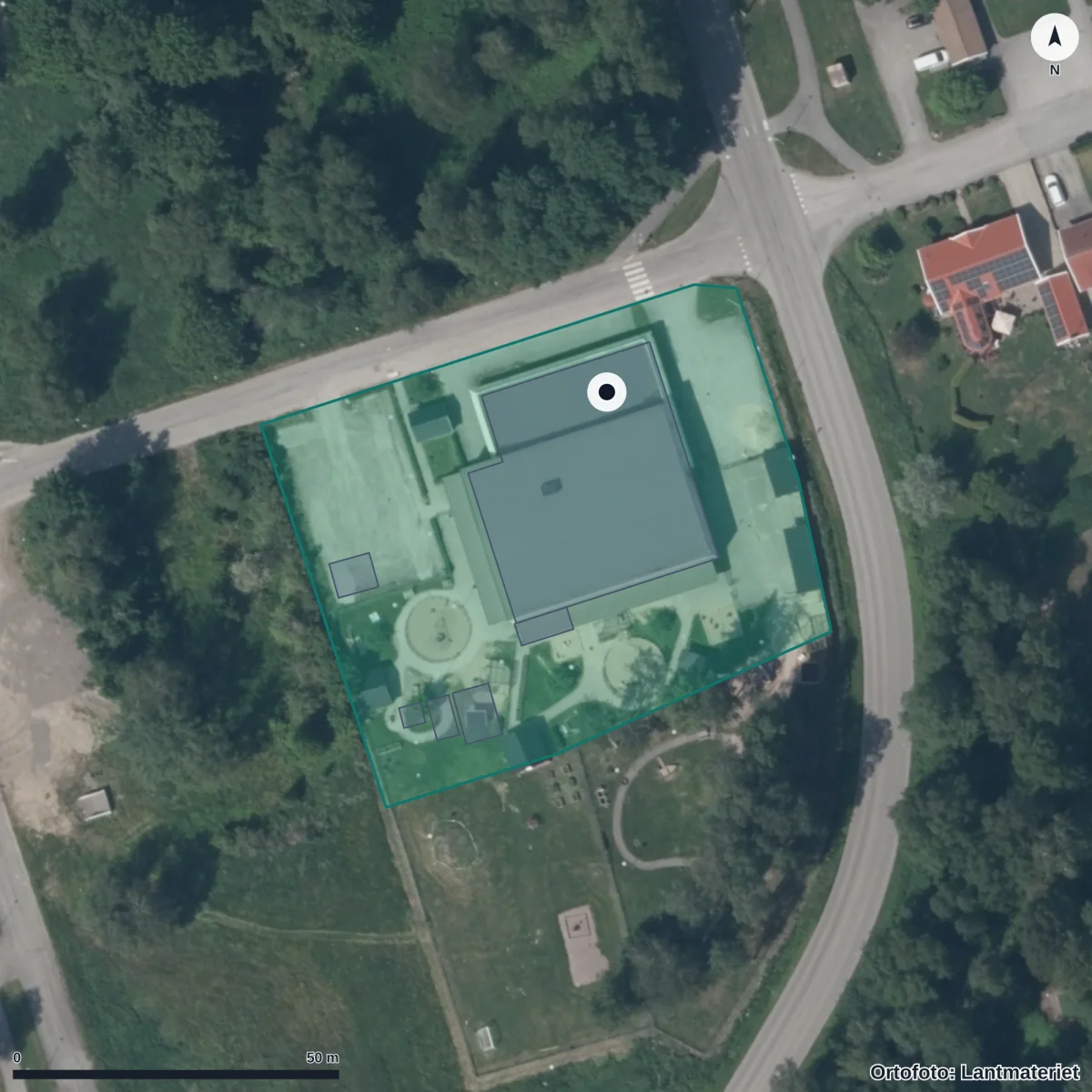 Flygbild över Förskolan Kompassen, ortofoto från Lantmäteriet