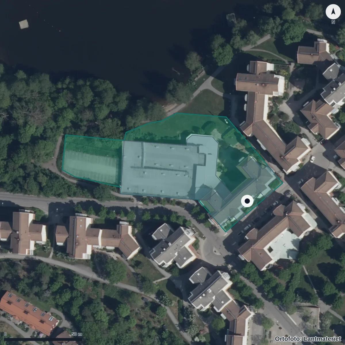Flygbild över Föräldrakooperativet Minnemalen, ortofoto från Lantmäteriet